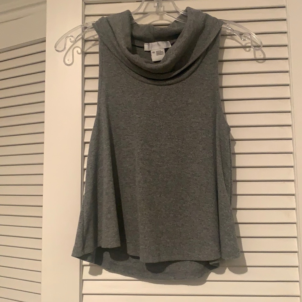 Grey turtle neck tank from cooperative in an XS.